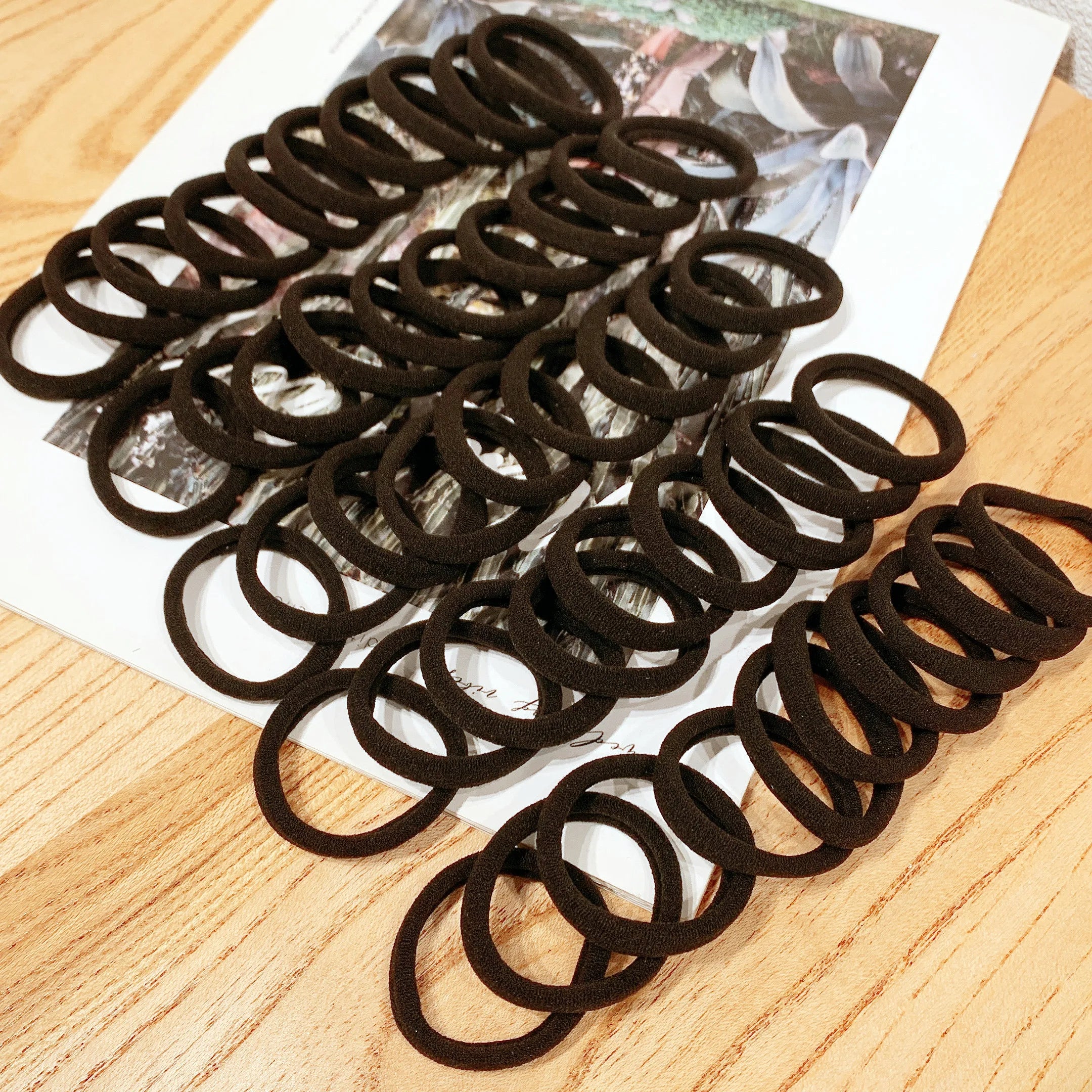 "Effortless Elegance: 50/100pcs Black Hair Bands – Your Ultimate Hair Accessory Collection!"